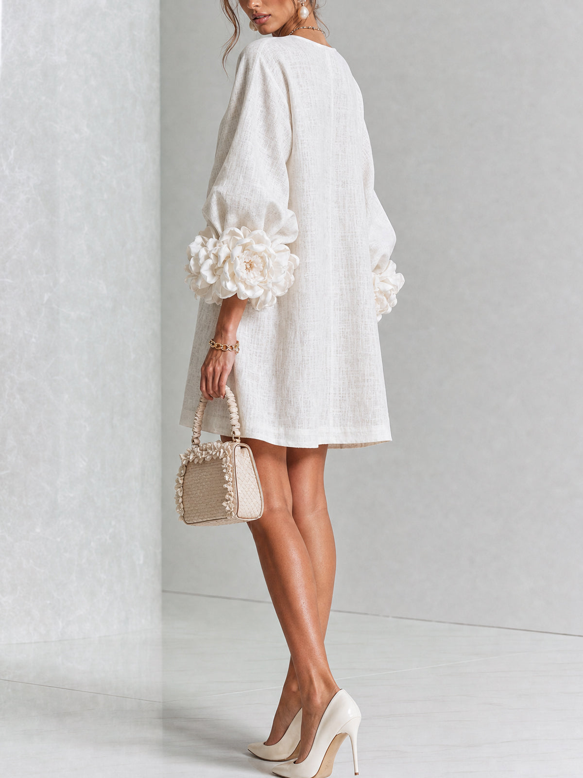 Nina™ | Losvallende Jurk met Knoopsluiting en Rozetmouwen 10