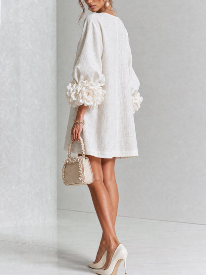 Nina™ | Losvallende Jurk met Knoopsluiting en Rozetmouwen 10